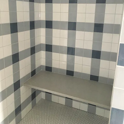 Plaid tile with walk in shower seat in Traverse City 